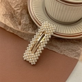 Detail of vintage rectangular pearl hair clip on gold base with textured background - Square-Gold BB Clip