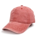Detailed side view of washed red cotton baseball cap with ventilation holes and stitching - Orange Red