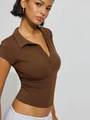Close-up of a slim fit dark brown polo shirt with button closure and cropped cut - S / Coffee