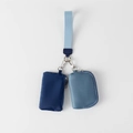 Detail view of dual nylon mini pouches in blue shades with metal clip on fabric lanyard - Navy Blue + Smoke Blue