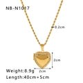Detailed view of a gold heart locket necklace with sparkling white rhinestones and twist chain - Rhinestone Heart Locket (NB-N1017) / Gold