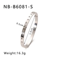 Detail showing the starburst engravings and dimensions on a silver stainless steel bangle - Silver Starburst Style (NB-B6081-S) / 18K Gold