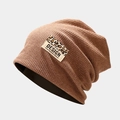 Brown knitted slouchy beanie hat with leopard print patch and vertical ribbed texture - Khaki