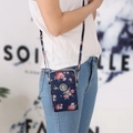 Mini crossbody phone bag with pink floral patterns on navy blue durable nylon fabric - Blue Rose