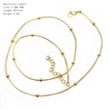 Detailed close-up of a 45cm gold-plated copper snake bone chain necklace with bead accents - O-Snake Chain