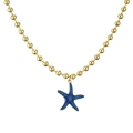 Gold plated ocean style necklace with a vibrant blue starfish enamel pendant on white - Blue