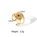 Detail of adjustable gold ring featuring a blue stone inlay and sunburst engraving - Sunray Style with Blue Center Stone (YYR023370)