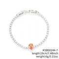 Silver tennis bracelet featuring white zircons and a pear-cut orange stone centerpiece - White Gold Yellow Zirconia