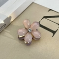 Pink resin five-petal flower hair clip with a sparkling white crystal center and gold base - Purple Gradient