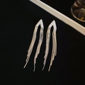 Detail shot of silver tassel earrings with geometric V-shape and shimmering crystals - V-Shape Geometric Tassel Style (7#)