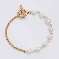 Detail view of the French Baroque pearl and gold chain bracelet with OT toggle clasp - 8# OT Buckle Freshwater Pearl Bracelet