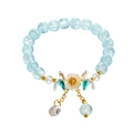 Blue crackle crystal beaded bracelet with white flower charm and golden metal accents - Flower Tassel Style 2 / Sky Blue