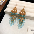 Close-up of vintage gold tassel earrings with blue beads and water-drop pendants - Blue Round Water Drop Tassel (18#)
