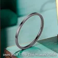 Macro shot of a 1mm ultra-thin minimalist stainless steel ring in deep gunmetal finish - US 10 / 1mm / Black