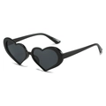 Fashionable heart-shaped black sunglasses for women with a sleek avant-garde frame design - Black Frame Grey Lens