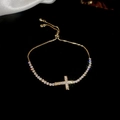Detail of gold cross bracelet with shimmering zircon stones on a dark background - Pavé Rhinestone Cross Style (5#)