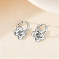 Silver flower-shaped titanium steel hoop earrings with a polished metallic finish - Four-leaf Clover / Steel
