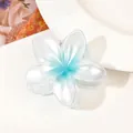 Detailed view of plumeria flower hair claw clip with blue and white gradient finish - Pearlescent Blue