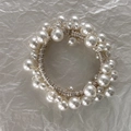 Elegant cream pearl hair tie with coiled metal wire base for minimalist hairstyles - Pearl Crystal