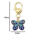 Blue and cyan butterfly keychain with heart clasp and dimension marking of 4.5x2.2cm - Blue