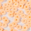 Perline piatte rotonde rosa chiaro in argilla polimerica per creazione gioielli fai-da-te - Nudo