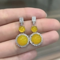 Detailed view of elegant silver earrings featuring round yellow chalcedony gemstones - Yellow Chalcedony Stud Earrings (White Gold Color)