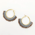 Detail of bohemian fan-shaped earrings with grey pearls and brown crystal beads - Gray