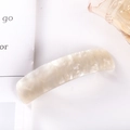 Detailed close-up of a pearlescent beige marble acetate spring hair clip on a white background - 11# Spring Clip (Pearly Beige Marble)