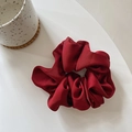 Elegant deep red satin silk scrunchie with soft ruffles on a clean white surface - Burgundy