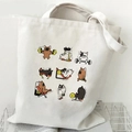 White canvas tote bag featuring funny French Bulldog fitness cartoon illustrations - Gym Fitness Bulldogs (E)