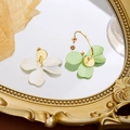 Elegant floral drop earrings with white and green petals on a golden mirror surface - Light Green Color-Blocked 3-Petal Drop Earrings
