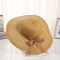 Natural straw sun hat with wide brim and bow accent for summer beach protection - Gold Dot Khaki
