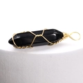 Polished black obsidian hexagonal point pendant wrapped in golden wire for necklace - Obsidian