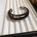 Minimalist open acrylic bangle with dark grey smoke marble pattern and thick smooth finish - Black