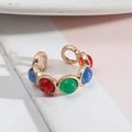 Detail of adjustable gold ring featuring vibrant red, blue, and green cabochon stones - Colorful 1 (Red Blue Green)