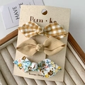 3-pack floral and plaid bow hair clips for girls on display card with wood background - Khaki Series
