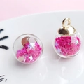 Pink star-shaped sequins inside a round crystal glass ball pendant with golden cap - 1.6x2.2cm / Rose Red