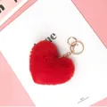 Portachiavi a cuore in peluche rosso con chiusura dorata su cartoncino decorativo - Rosso