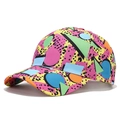 Tie-dye baseball cap featuring vibrant geometric prints in pink, yellow and mint green - Retro Memphis Style
