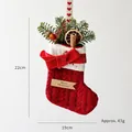 Red knit Christmas stocking with cinnamon, orange slices and Merry Christmas tag - Red Bow Decorative Stocking