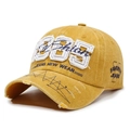 Vintage mustard yellow baseball cap with 1985 embroidery and distressed brim details - Yellow
