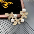 Elegant gold butterfly brooch featuring white pearls and sparkling rhinestone crystal accents - BZ019 Butterfly Pearl Fan