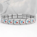 Macro shot of stainless steel Italian charm bracelet with red and blue heart enamel - Double Heart-Blue Red (18 Links)