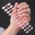 Short square-oval glossy press-on nails in soft peach pink finish on a black background - Light Peach (DFYL-08)
