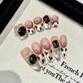French leopard cat-eye press-on nails set with red rhinestones and bow accents - XS / Short Trapezoid (2450)