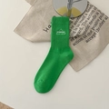 Grasgroene geribbelde katoenen sokken met wit dreamer borduursel voor dames - Eén maat / Kiwigroen