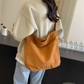 Large capacity canvas tote bag in caramel orange finish with side pocket for women - Brown