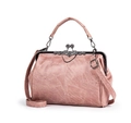 Pink vintage PU leather handbag with metal kiss-lock frame and adjustable strap - Pink