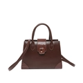 Elegant dark brown crossbody bag with crocodile texture details and dual handles - Brown