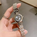 Elegant silver women's quartz watch with Roman numerals and metal mesh bracelet - Silver/White